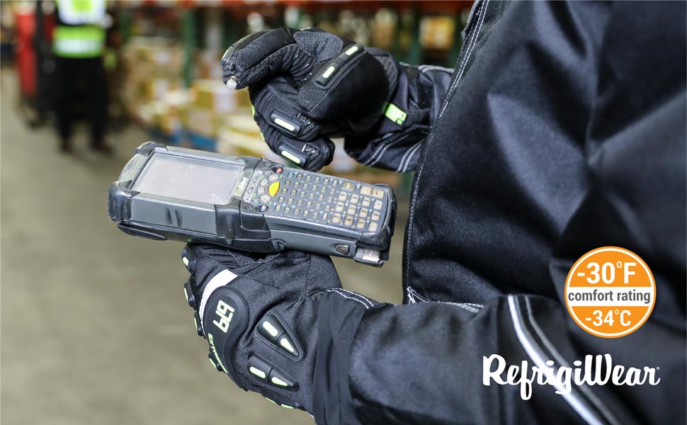 Close of someone wearing the Extreme Freezer glove with the touch rite nib on a handheld scanner