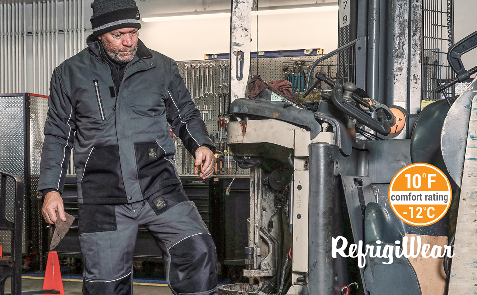 Man working in a shop in the cold wearing the Chillshield jackets and pants